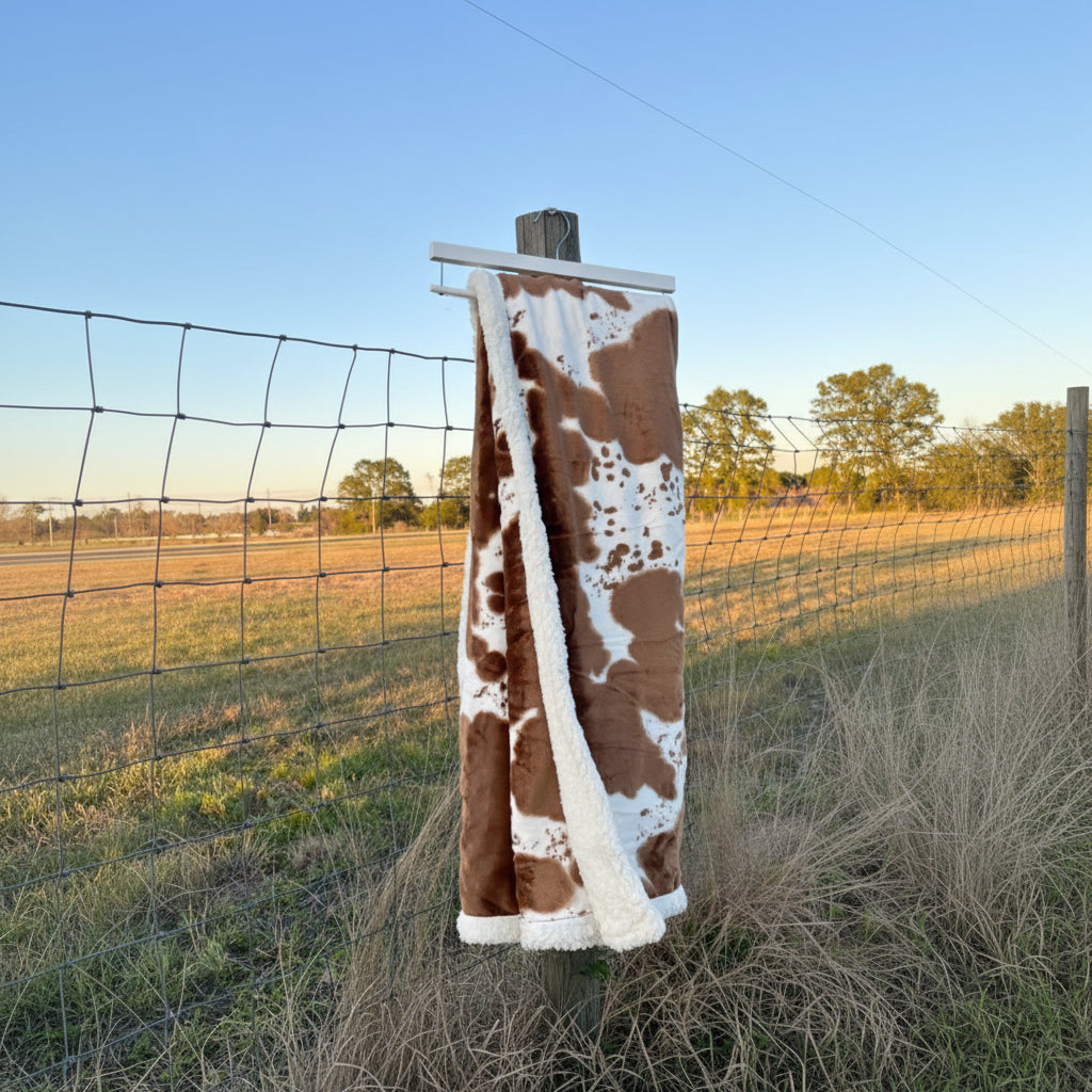 Onze deken met koemotief 100x150cm